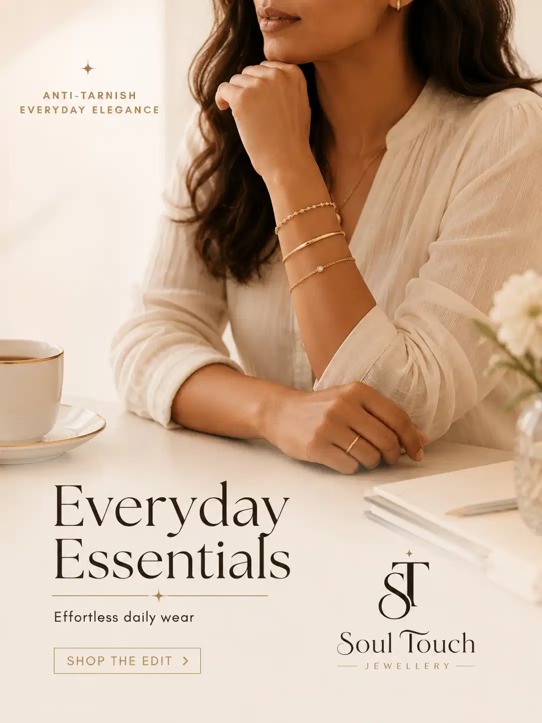 Woman wearing everyday anti-tarnish gold bracelets with an ivory blouse