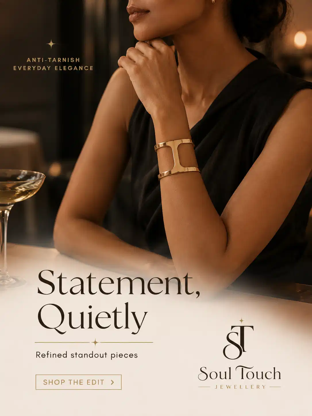 Woman wearing quiet-luxury gold statement cuff bracelet