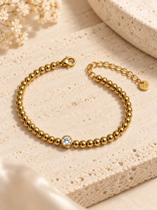 Aurelle gold beaded bracelet with centre stone and adjustable clasp