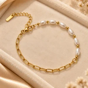 Aurelle gold pearl link bracelet with white oval beads and paperclip chain