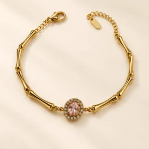 Elara pink stone gold link bracelet with clear halo detailing for women