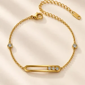 Linea Trio gold bar chain bracelet with clear stone accents for women