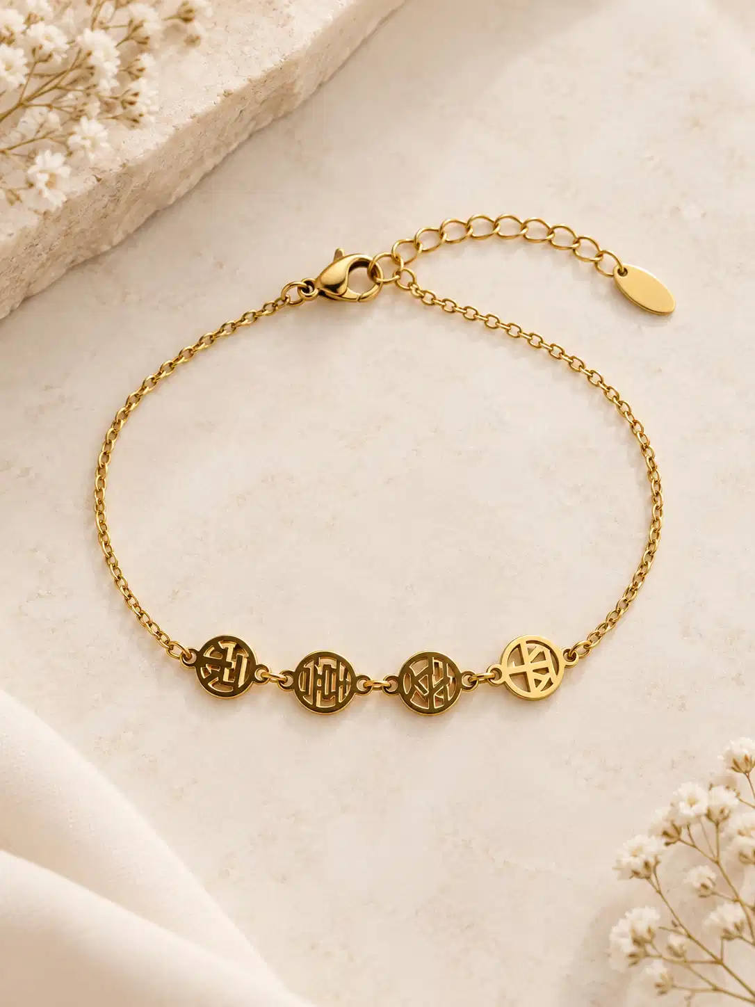 Mira gold medallion chain bracelet with four geometric openwork motifs for women