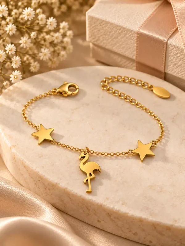 Stella gold flamingo charm bracelet with two star motifs for women